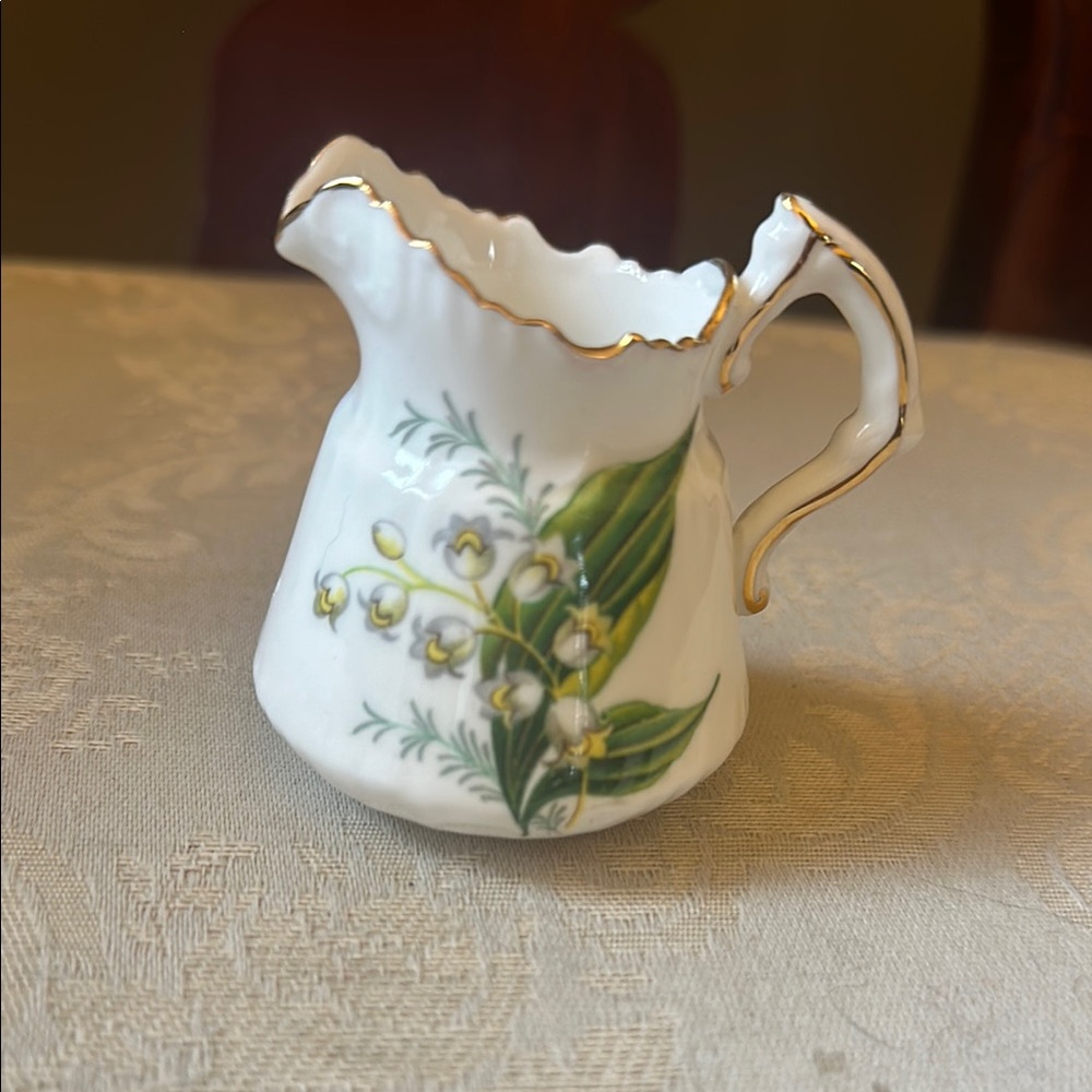 Hammersley Lily of the Valley bone China creamer, gold trim